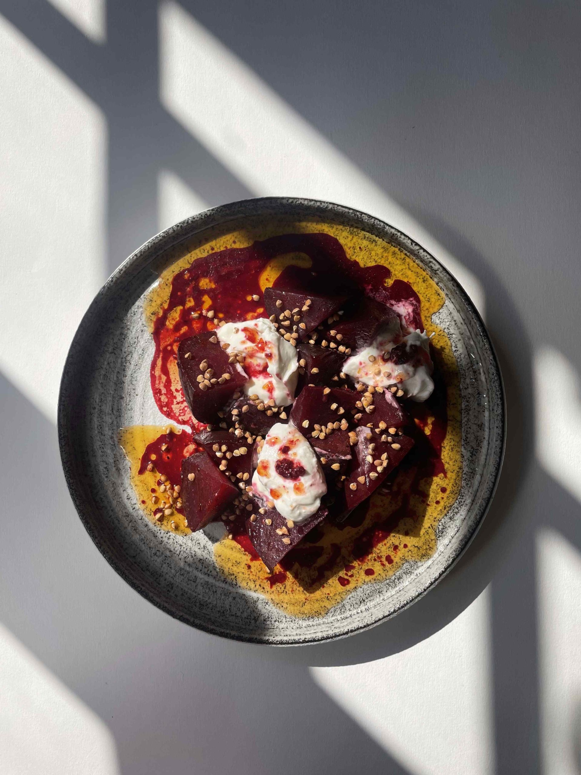 Sautéed beets with Bordier Raspberry Butter, burrata and grilled buckwheat