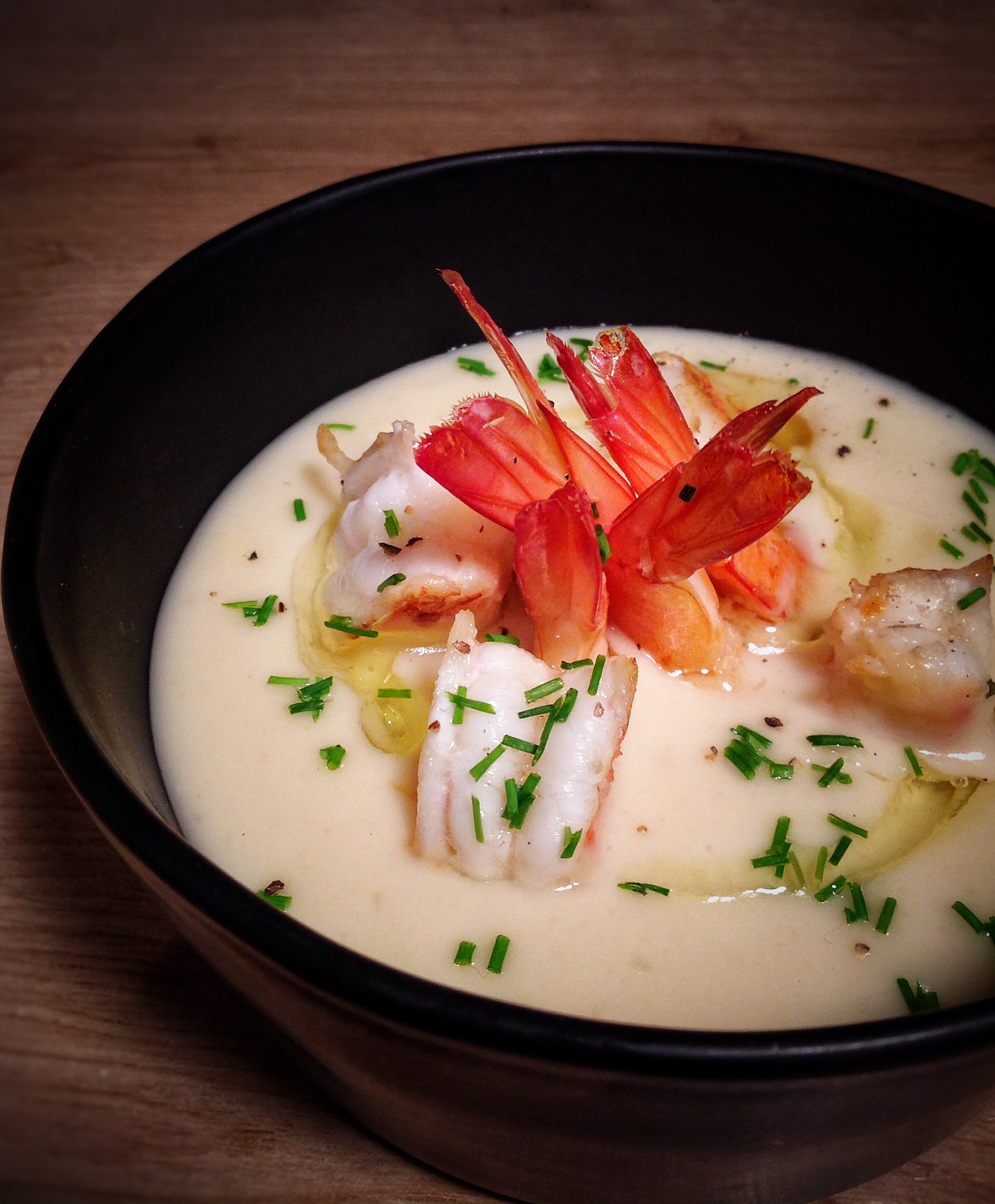 Cream of Jerusalum Artichoke with Bordier Onion Butter and Roast Prawns